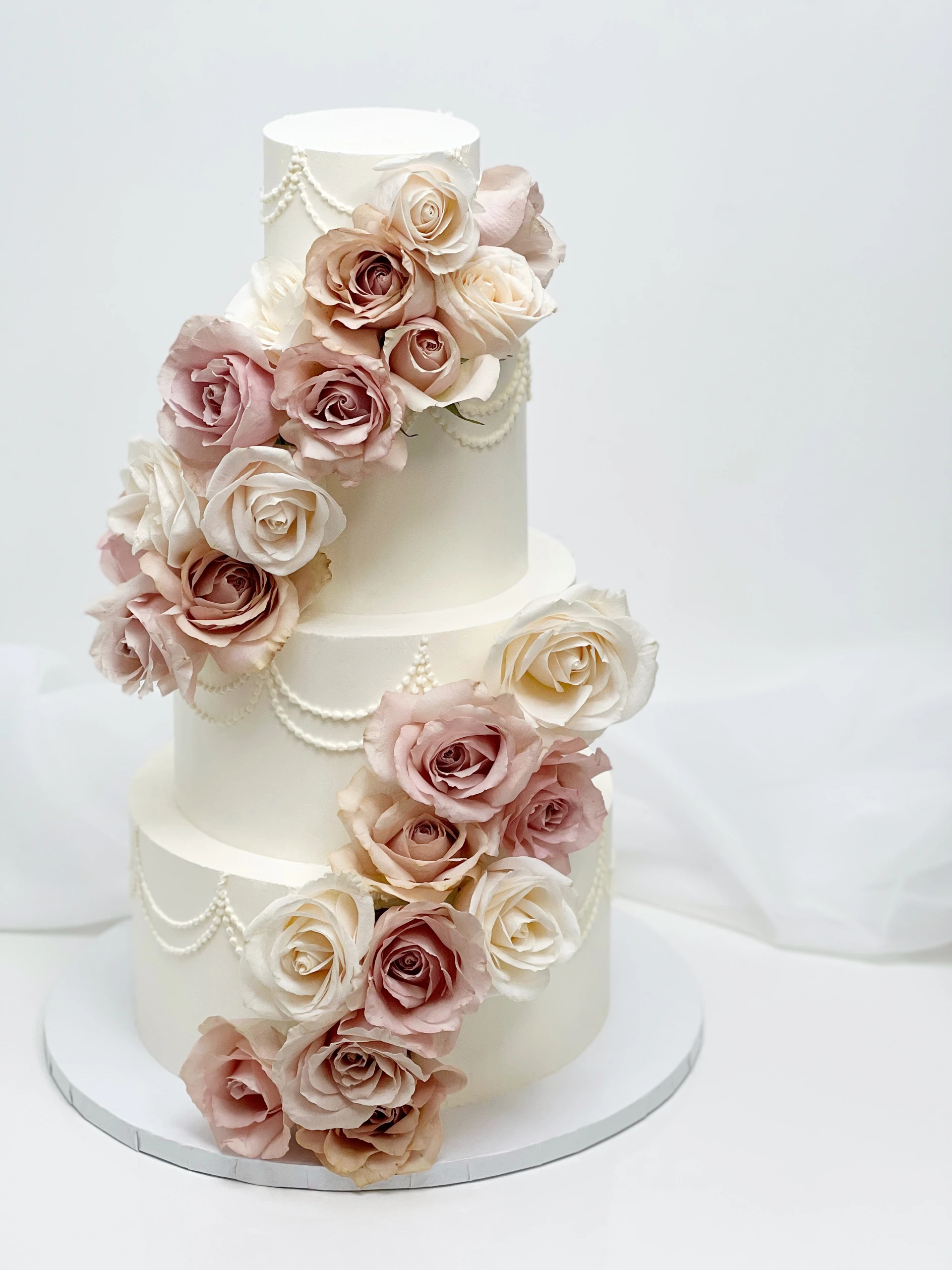 05-four-tier-white-cake-peachy-roses
